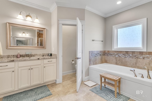 full bath featuring crown molding, toilet, vanity, baseboards, and a bath