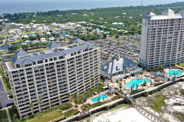 527 Beach Club Trl Unit C110, Gulf Shores, AL 36542 - aerial view of a pool and a large body of water
