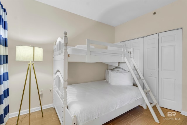 527 Beach Club Trl Unit C110, Gulf Shores, AL 36542 - bedroom featuring wood finished floors and baseboards