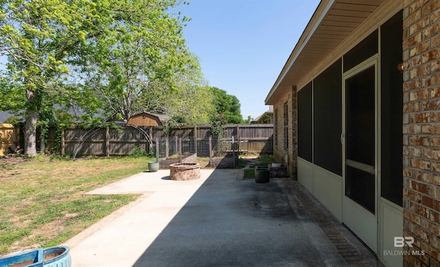 343 Stave Mill Rd, Fairhope, AL 36532 - view of patio / terrace featuring a fenced backyard and an outdoor fire pit