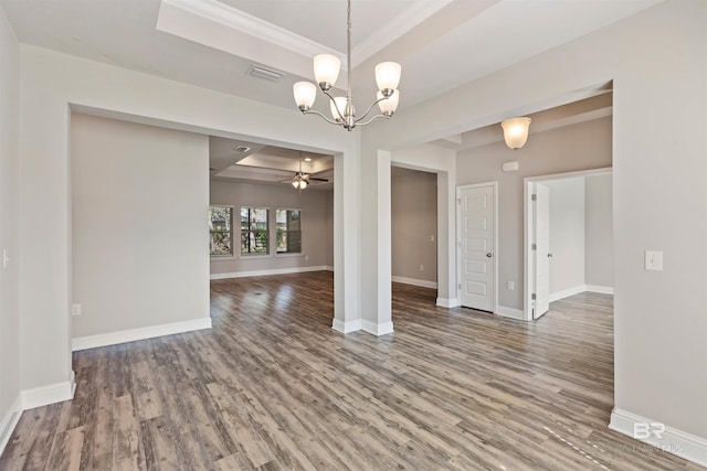 343 Stave Mill Rd, Fairhope, AL 36532 - interior space featuring a tray ceiling, baseboards, visible vents, ceiling fan with notable chandelier, and wood finished floors