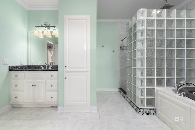 bathroom featuring a bathing tub, ornamental molding, tile floors, and vanity