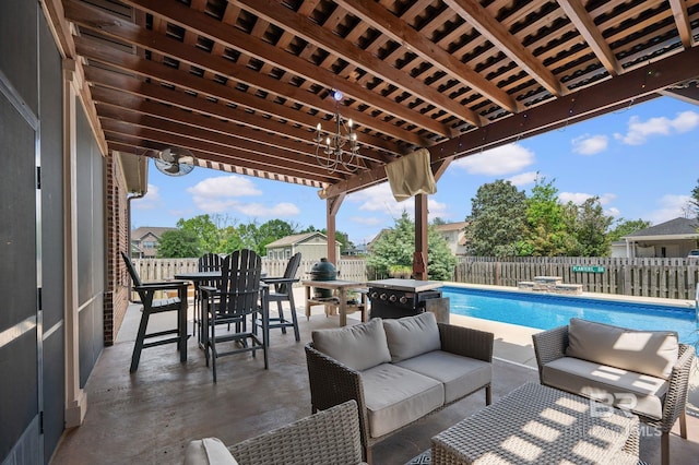 view of patio / terrace with an outdoor hangout area, a fenced in pool, outdoor dining area, and a fenced backyard