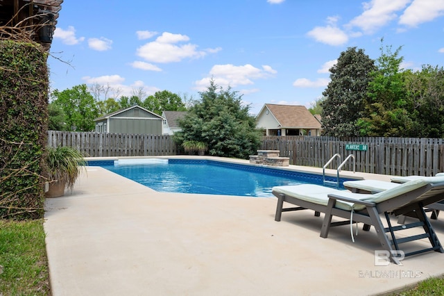 view of pool with a fenced backyard, a patio, and a fenced in pool