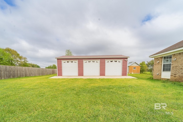 detached garage with fence