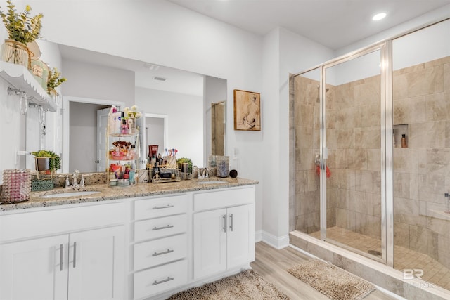 3905 Mercury Cir, Gulf Shores, AL 36542 - bathroom with a sink, double vanity, and a shower stall