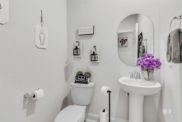 3905 Mercury Cir, Gulf Shores, AL 36542 - bathroom featuring toilet and a sink