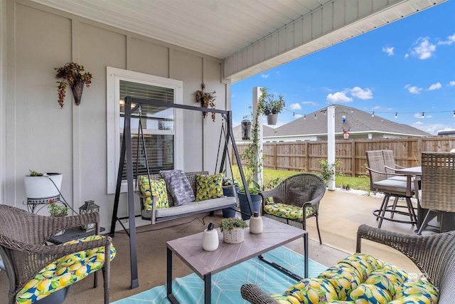 3905 Mercury Cir, Gulf Shores, AL 36542 - view of patio with outdoor dining area and a fenced backyard