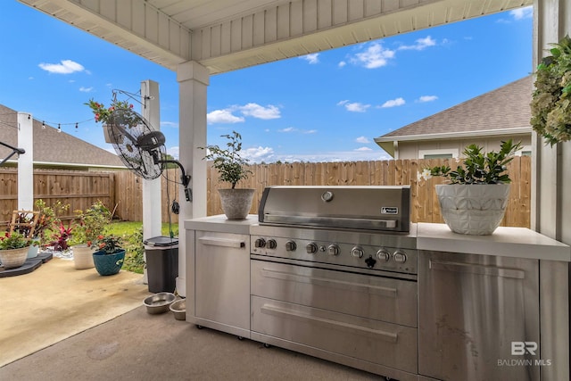 3905 Mercury Cir, Gulf Shores, AL 36542 - view of patio with fence and a grill