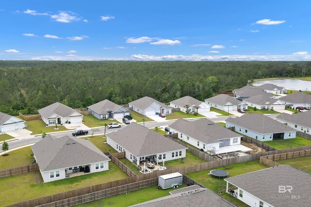 3905 Mercury Cir, Gulf Shores, AL 36542 - birds eye view of property featuring a water view, a forest view, and a residential view