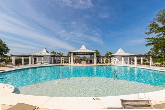 3905 Mercury Cir, Gulf Shores, AL 36542 - pool featuring a gazebo and a patio