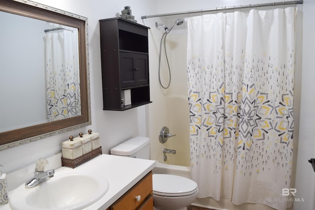 full bathroom with shower / bathtub combination with curtain, toilet, and vanity