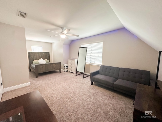 interior space featuring vaulted ceiling and ceiling fan