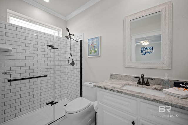 2420 Bienville Blvd, Dauphin Island, AL 36528 - bathroom with a stall shower, toilet, vanity, ornamental molding, and a ceiling fan