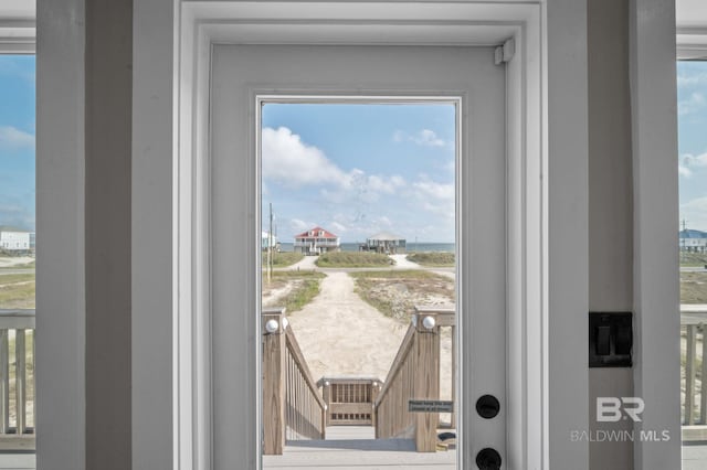 2420 Bienville Blvd, Dauphin Island, AL 36528 - doorway featuring healthy amount of natural light