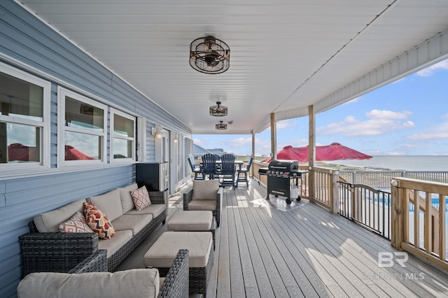 2420 Bienville Blvd, Dauphin Island, AL 36528 - deck featuring an outdoor hangout area, area for grilling, and a water view