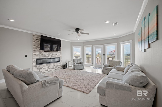 2420 Bienville Blvd, Dauphin Island, AL 36528 - living area featuring healthy amount of natural light, a fireplace, crown molding, recessed lighting, and a ceiling fan