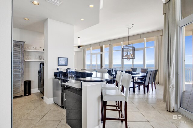 14237 Perdido Key Dr Unit Ph-1401, Pensacola, FL 32507 - kitchen featuring plenty of natural light, visible vents, and light tile patterned floors