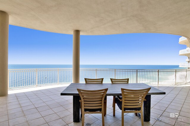 14237 Perdido Key Dr Unit Ph-1401, Pensacola, FL 32507 - view of patio / terrace featuring outdoor dining area and a water view