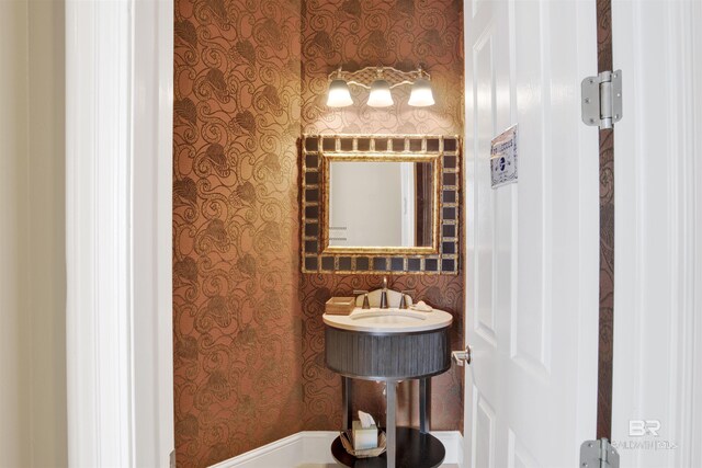 14237 Perdido Key Dr Unit Ph-1401, Pensacola, FL 32507 - bathroom with a sink and wallpapered walls