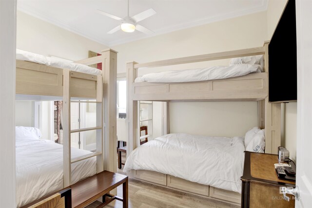 14237 Perdido Key Dr Unit Ph-1401, Pensacola, FL 32507 - bedroom with wood finished floors, a ceiling fan, and ornamental molding