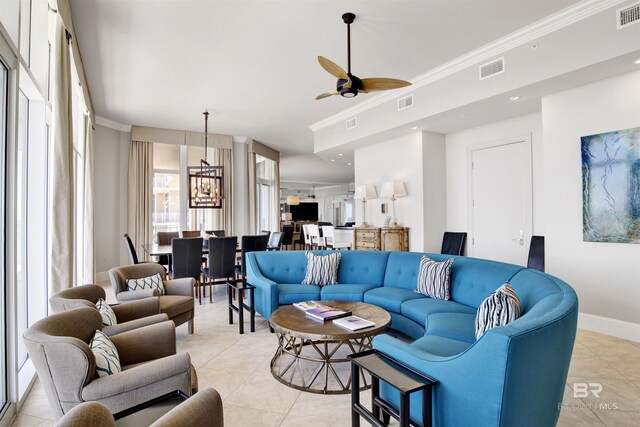 14237 Perdido Key Dr Unit Ph-1401, Pensacola, FL 32507 - living room featuring ornamental molding, light tile patterned flooring, visible vents, and ceiling fan with notable chandelier
