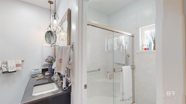 bathroom with vanity and an enclosed shower