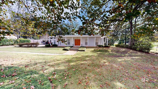 single story home featuring a porch and a front lawn