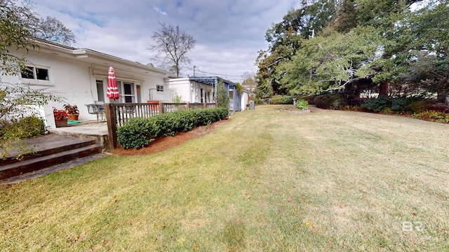 view of yard featuring a deck