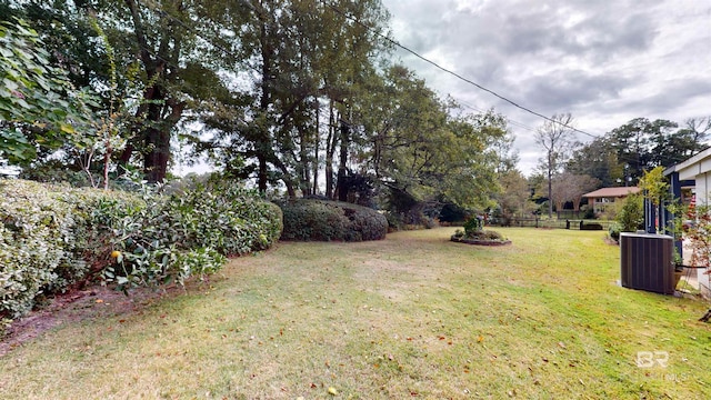 view of yard featuring central AC unit