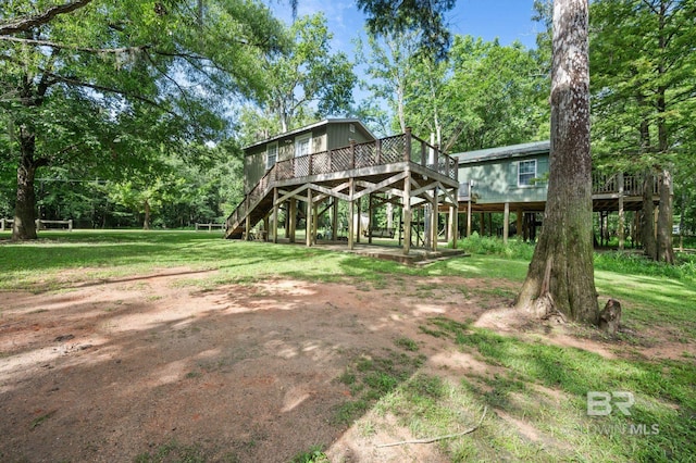 view of yard featuring a deck