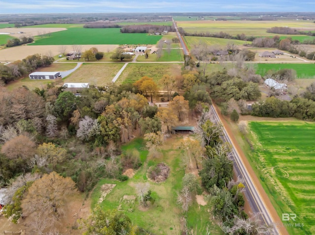 birds eye view of property featuring a rural view