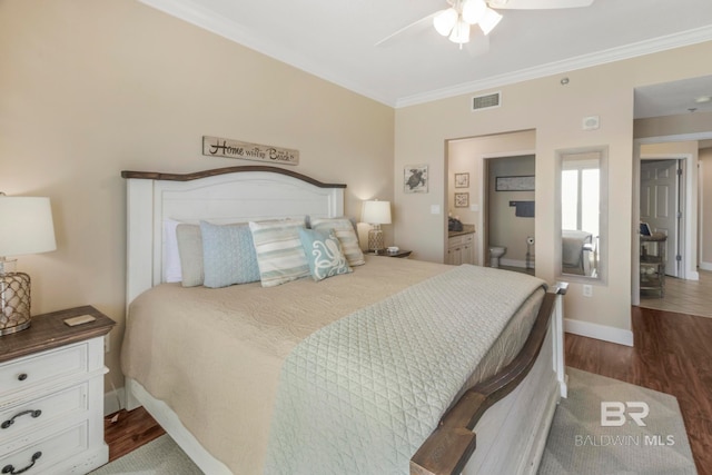 bedroom with connected bathroom, ceiling fan, crown molding, and dark hardwood / wood-style floors