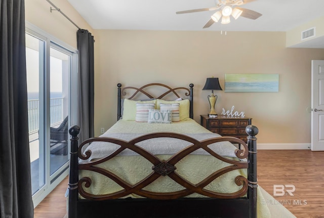 bedroom featuring ceiling fan and light hardwood / wood-style flooring