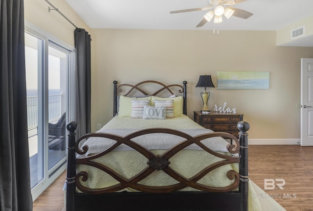 401 E Beach Blvd Unit 1704, Gulf Shores, AL 36542 - bedroom featuring wood finished floors, baseboards, and a ceiling fan