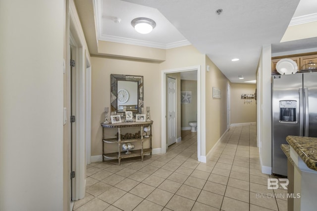 401 E Beach Blvd Unit 1704, Gulf Shores, AL 36542 - corridor with light tile patterned floors, crown molding, and baseboards