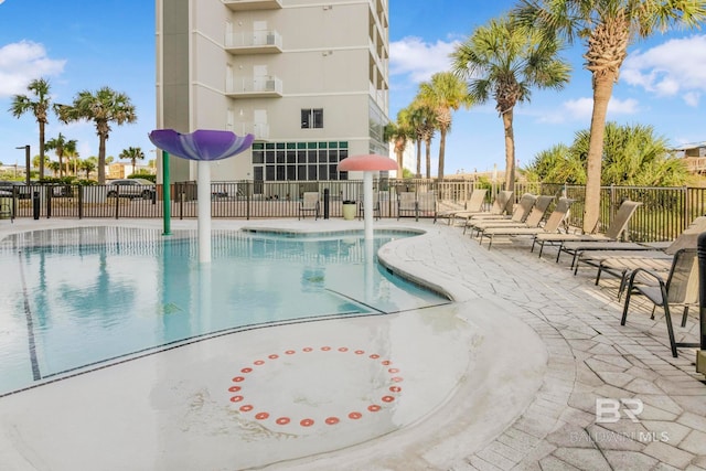 view of pool featuring a patio