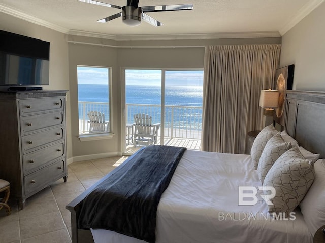 bedroom featuring light tile patterned flooring, a water view, ornamental molding, and access to outside