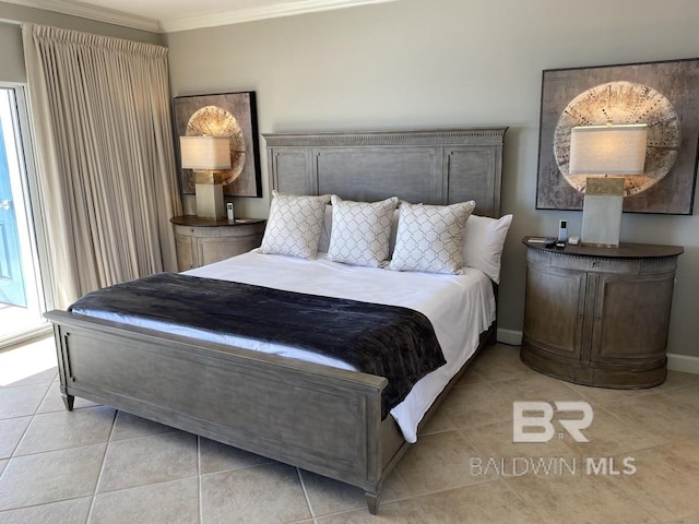 bedroom featuring baseboards, ornamental molding, and light tile patterned floors