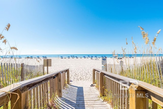 view of water feature with a beach view