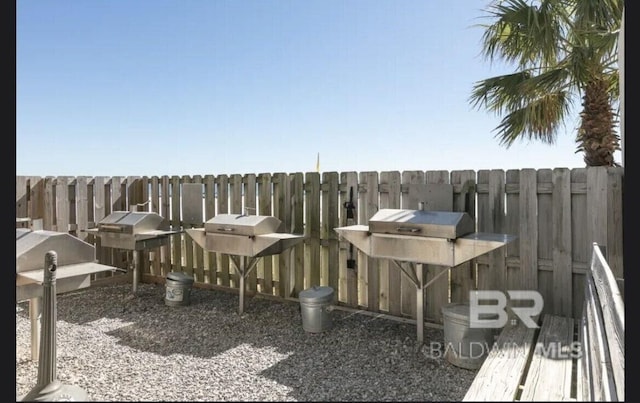 view of patio with fence