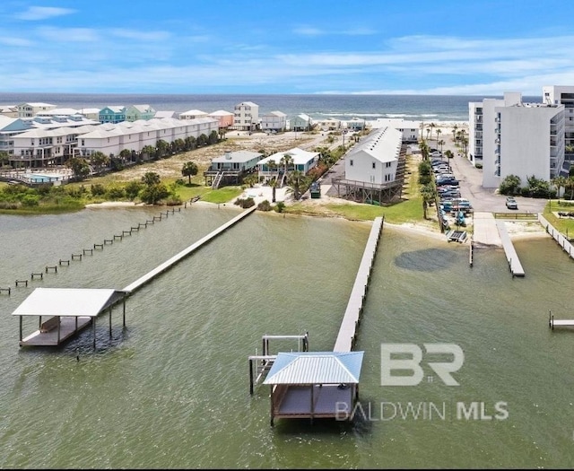 drone / aerial view featuring a water view