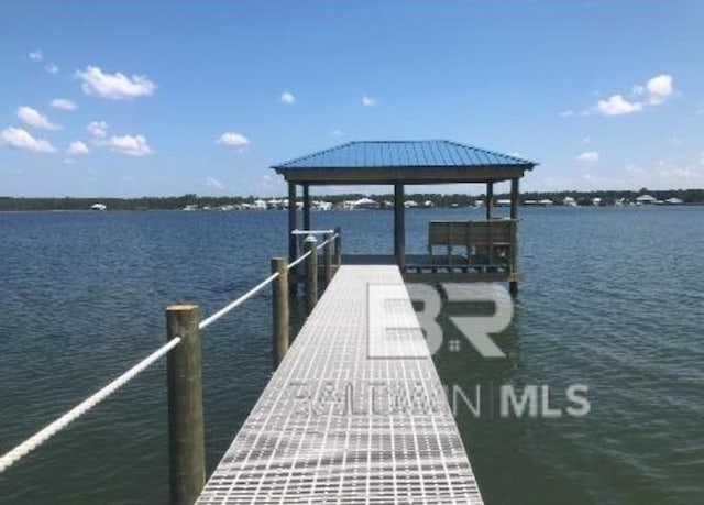 view of dock with a water view