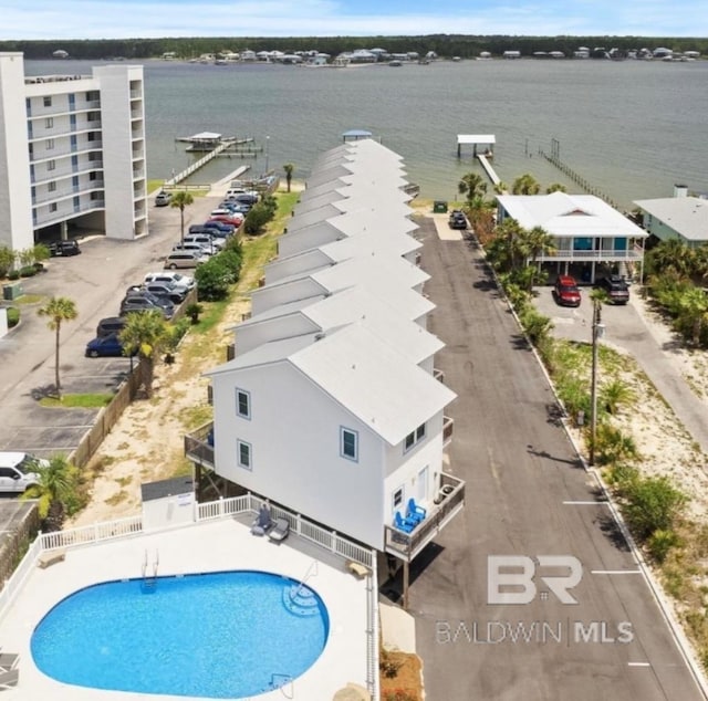 drone / aerial view with a water view