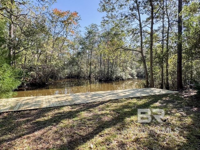 7228 Fairmont Dr, Foley, AL 36535 - view of yard featuring a dock