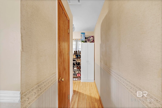 corridor featuring light hardwood / wood-style flooring