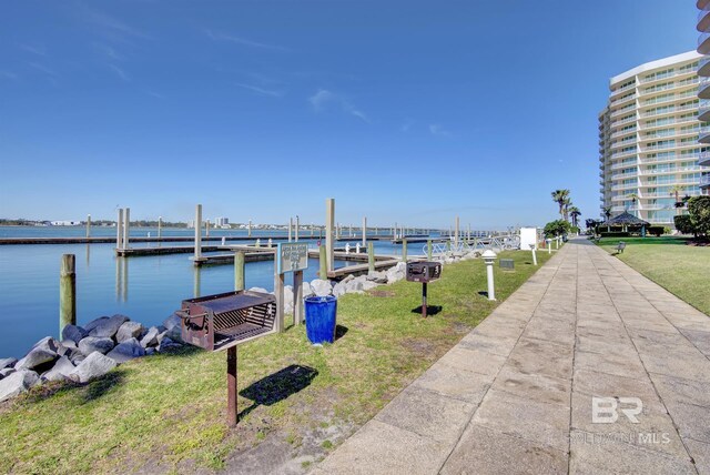 28107 Perdido Beach Blvd Unit D512, Orange Beach, AL 36561 - dock featuring a water view and a yard