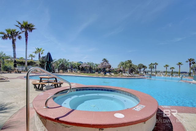 28107 Perdido Beach Blvd Unit D512, Orange Beach, AL 36561 - community pool featuring a patio and a community hot tub