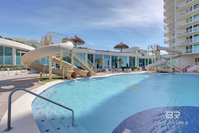 28107 Perdido Beach Blvd Unit D512, Orange Beach, AL 36561 - community pool with a water slide, a patio area, and stairs