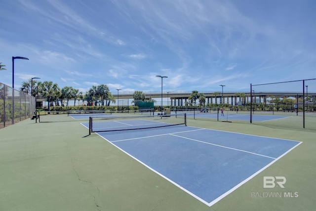 28107 Perdido Beach Blvd Unit D512, Orange Beach, AL 36561 - view of tennis court featuring community basketball court